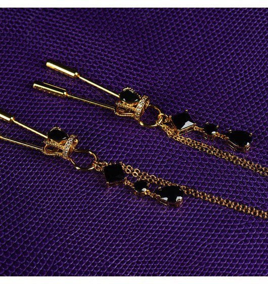 Upko Crown and dangling side nipple clamps
